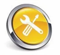 travailleur répare une machine